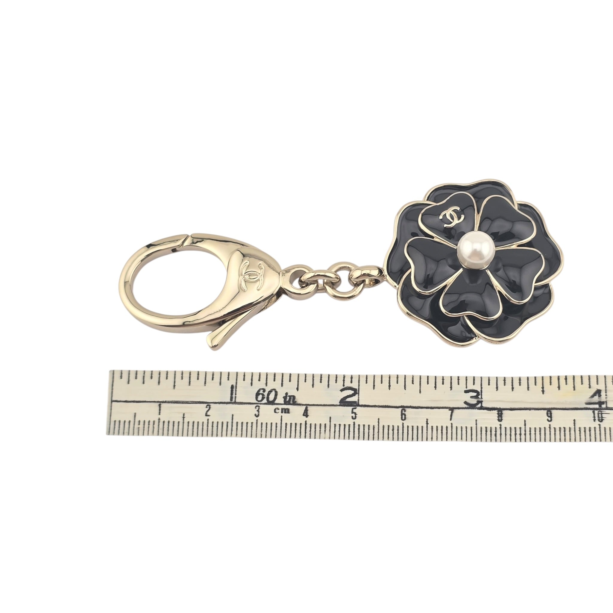 Chanel CC Black Enamel Camellia Keychain Bag Charm 2025 CHANEL
