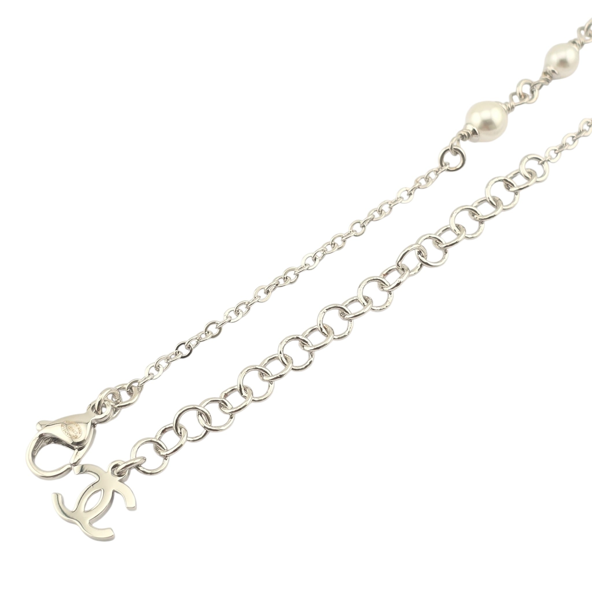 Chanel CC Black Enamel Camellia Pearl Pendant Necklace 2025 CHANEL