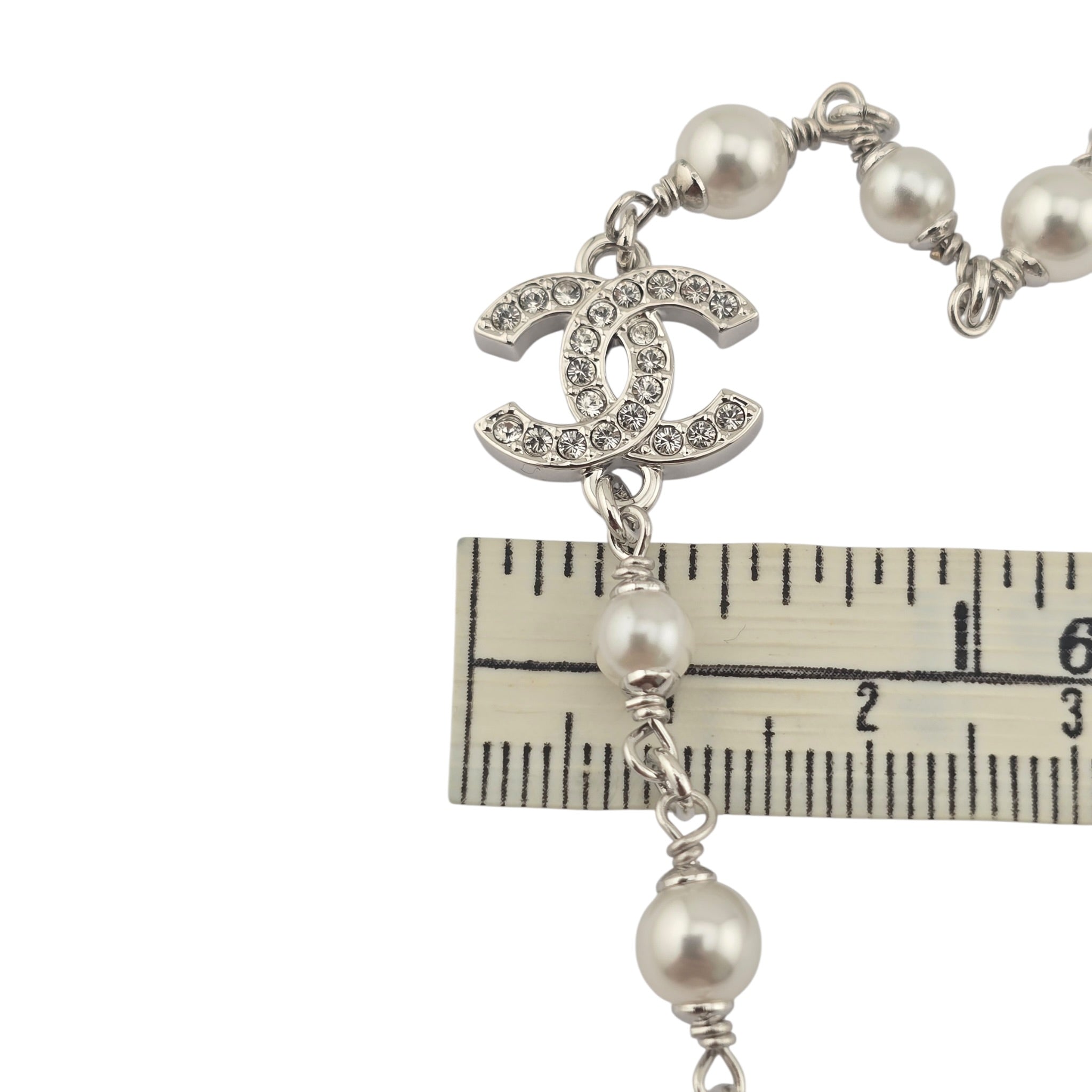 Chanel CC Black Enamel Camellia Pearl Pendant Necklace 2025 CHANEL