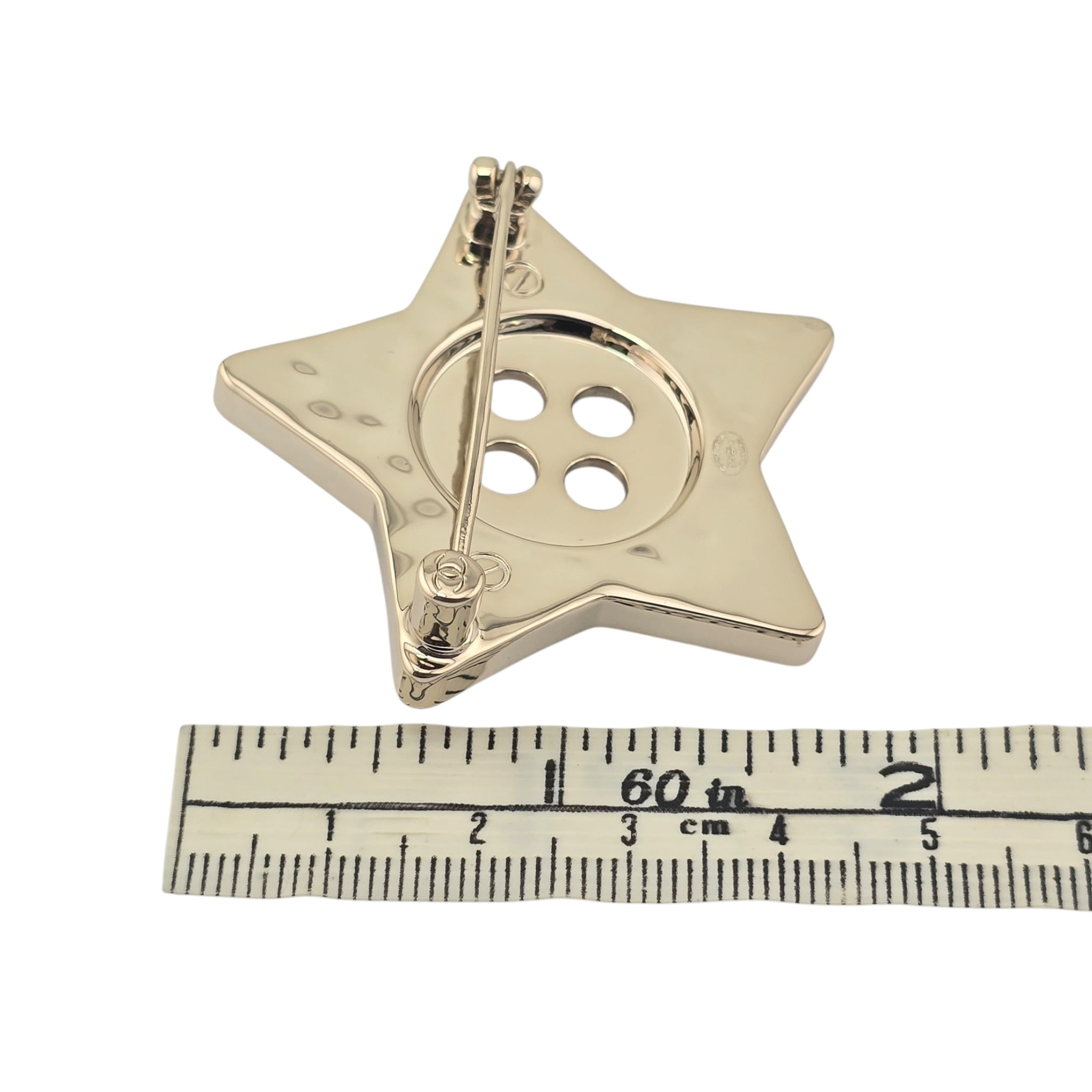 Chanel CC Star Button Brooch Gold 2025 CHANEL