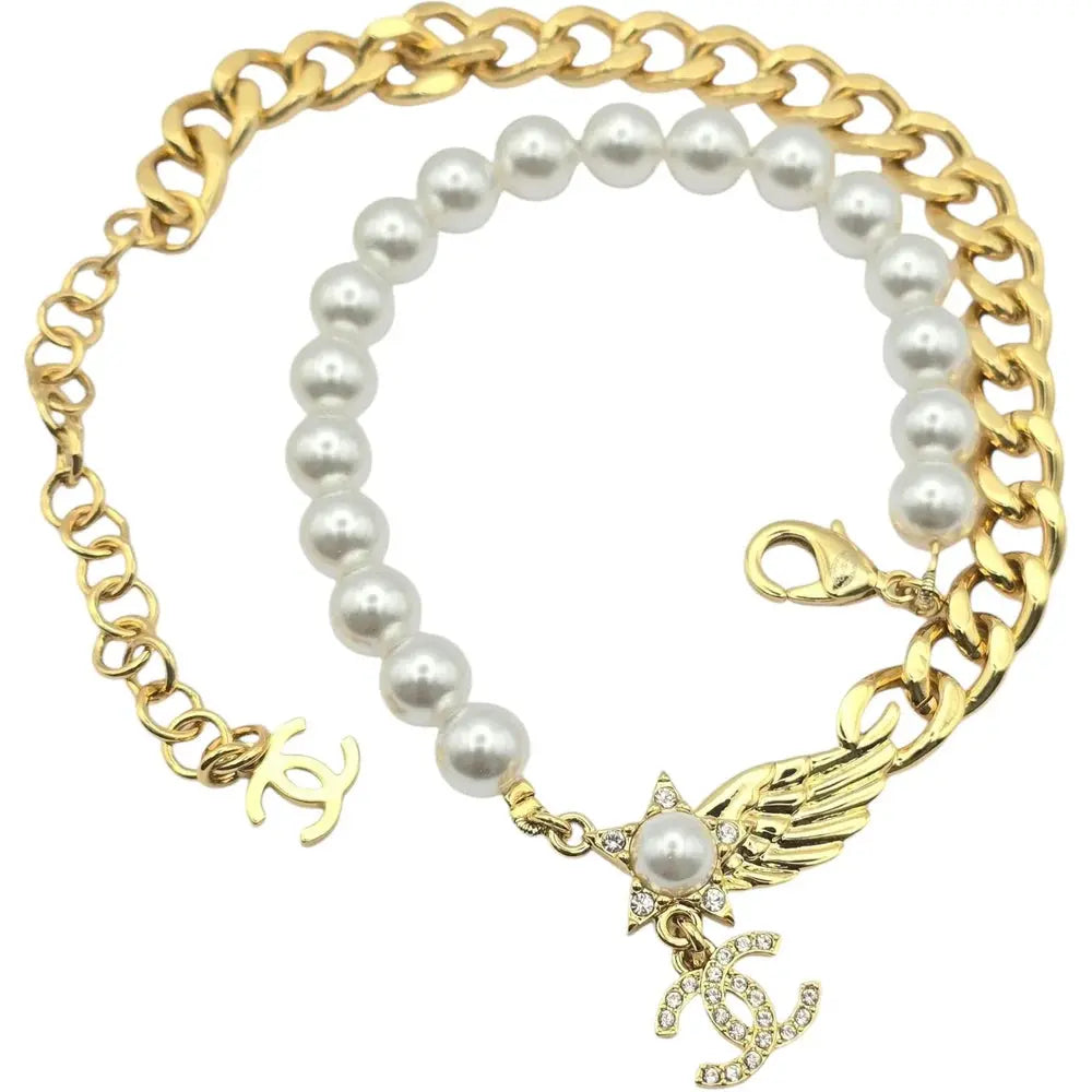 Chanel CC Star Wing Faux Pearl Choker Necklace 2024 CHANEL