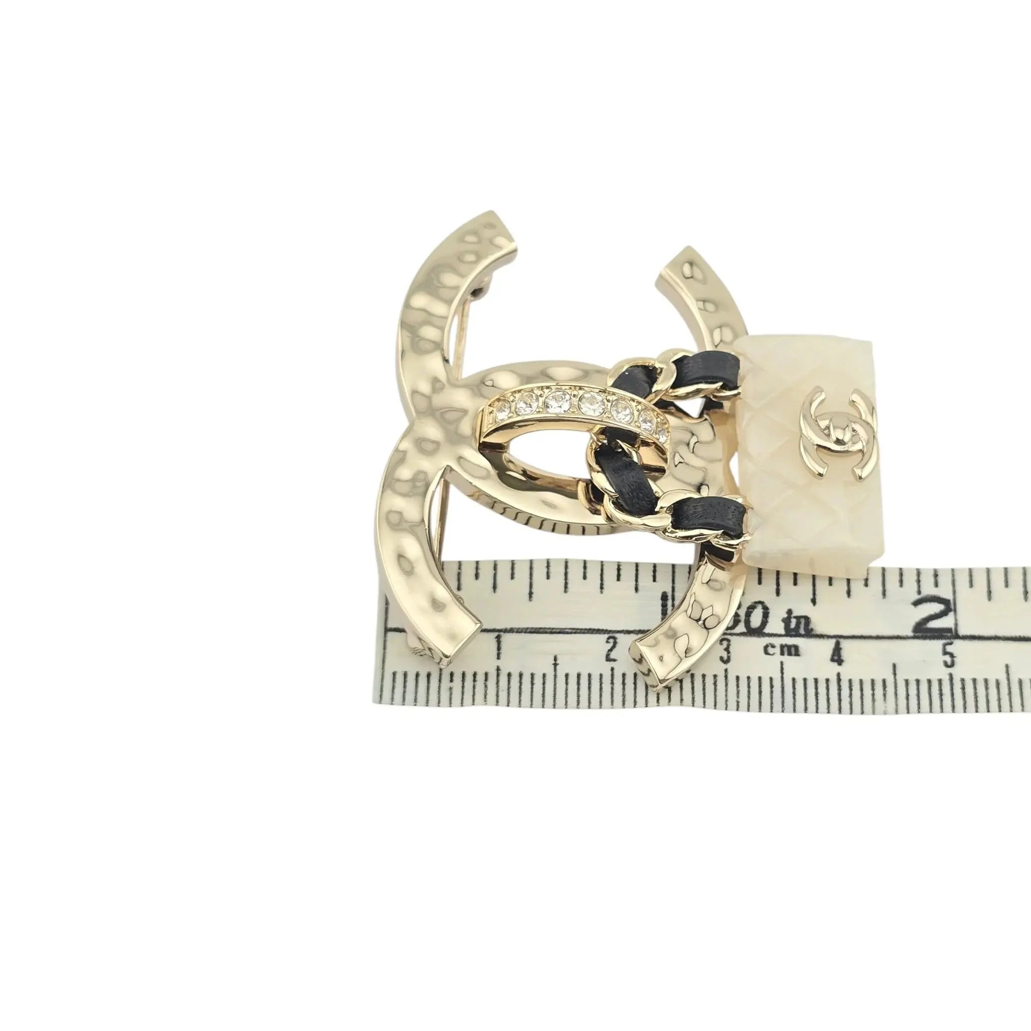 Chanel CC Crystal Resin Flap Bag Brooch Gold White 2023 CHANEL