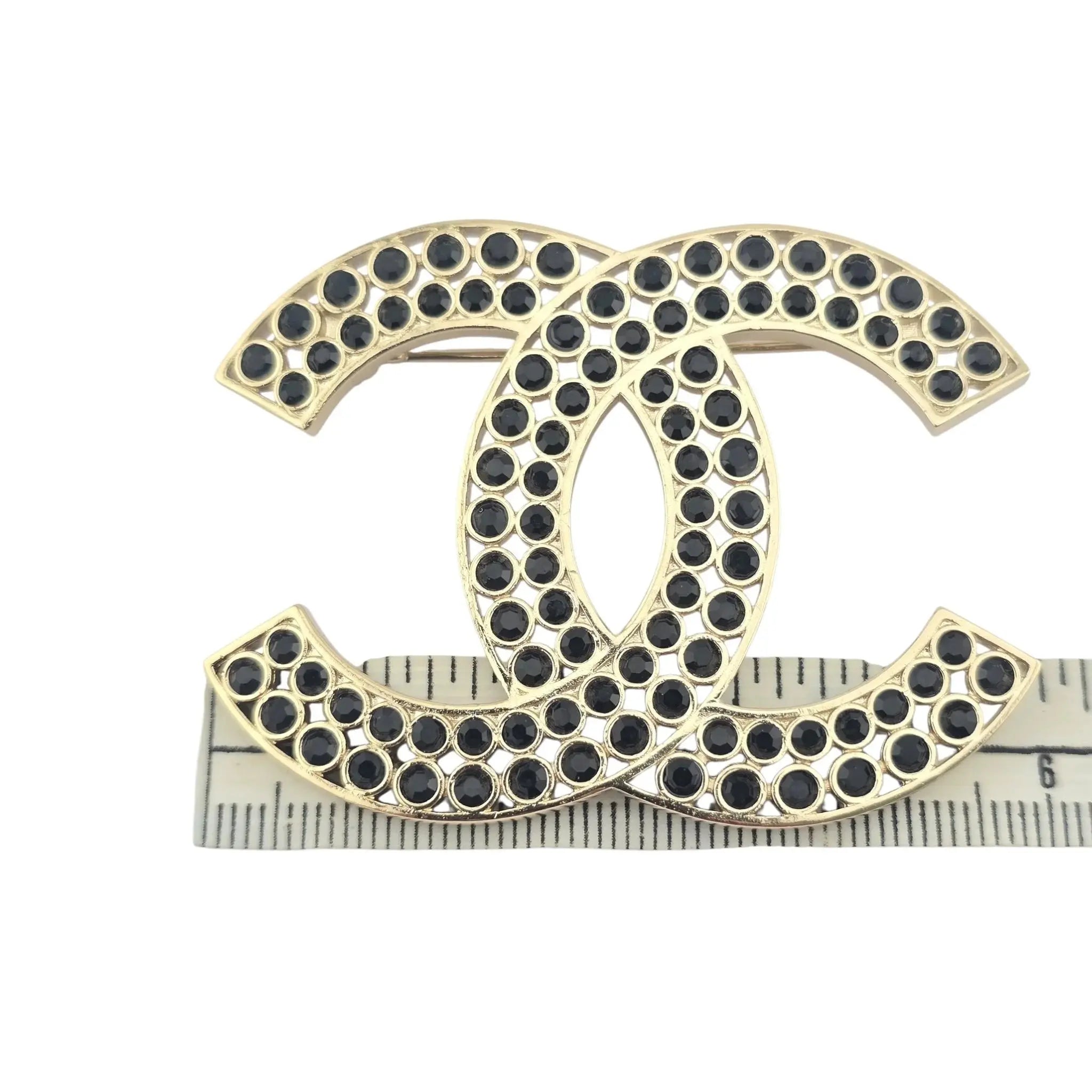 Chanel CC Metal Crystal Brooch Gold Black 2023 CHANEL