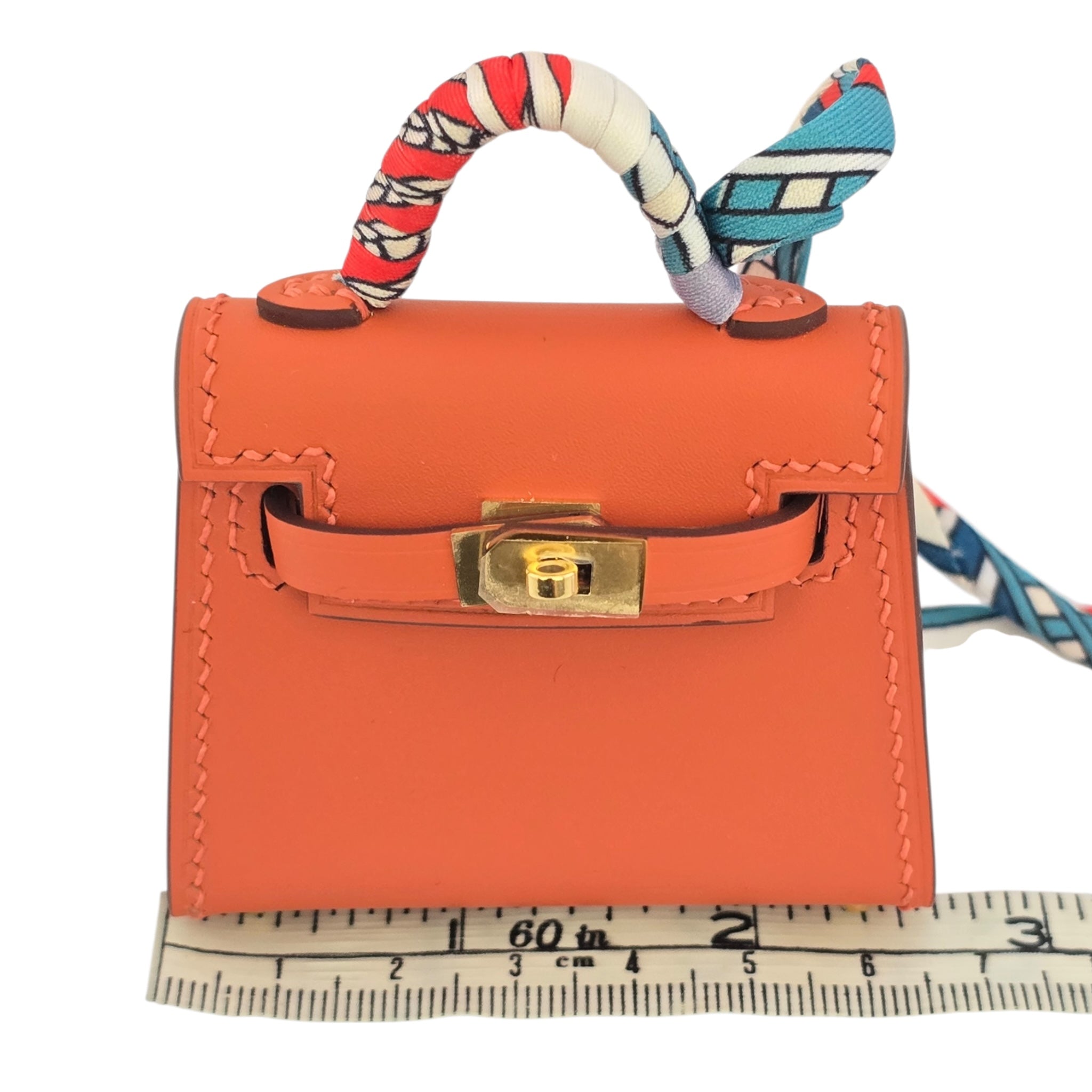 Hermes Tadelakt Mini Kelly Twilly Bag Charm Capucine HERMES
