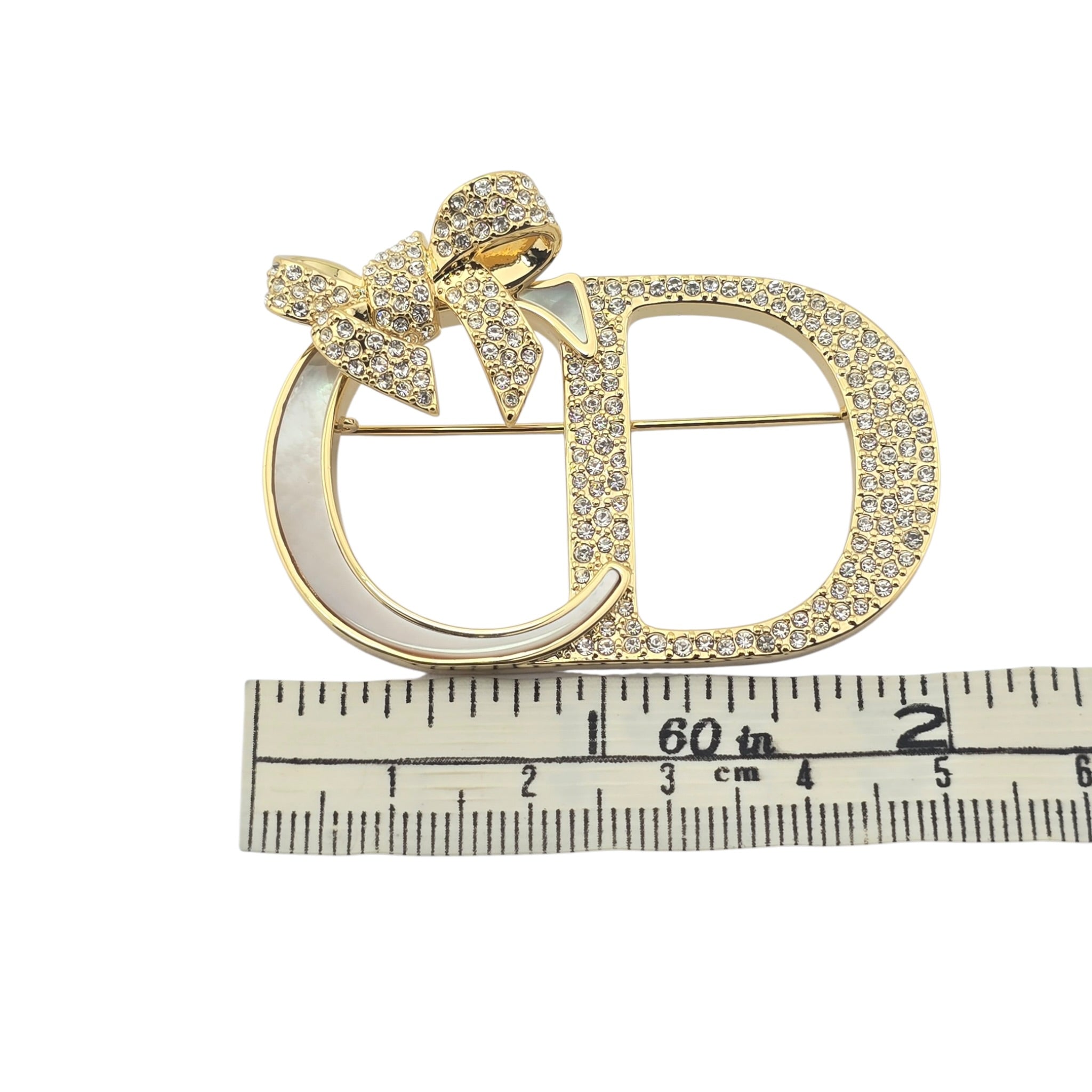 Dior Or – Dior Shiny Bow Brooch DIOR