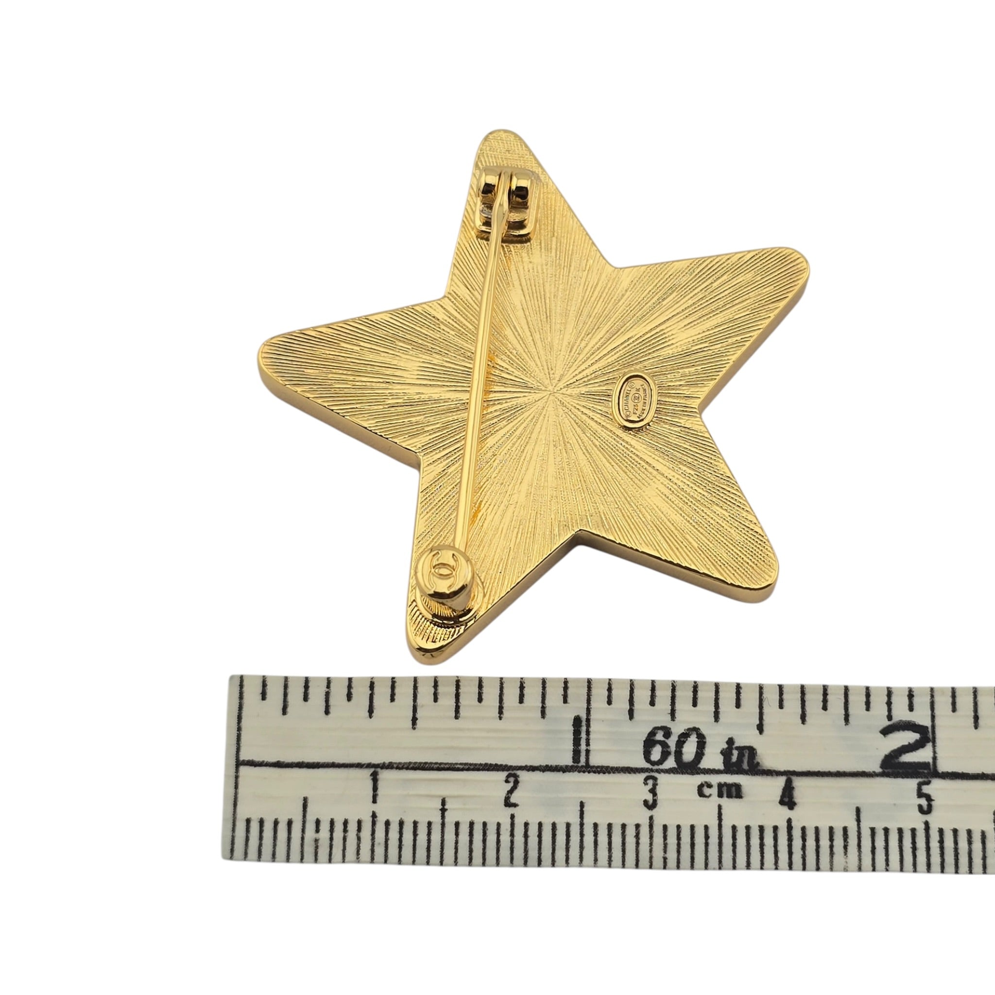 Chanel CC Star Metal Resin Logo Brooch Gold Black 2024 CHANEL