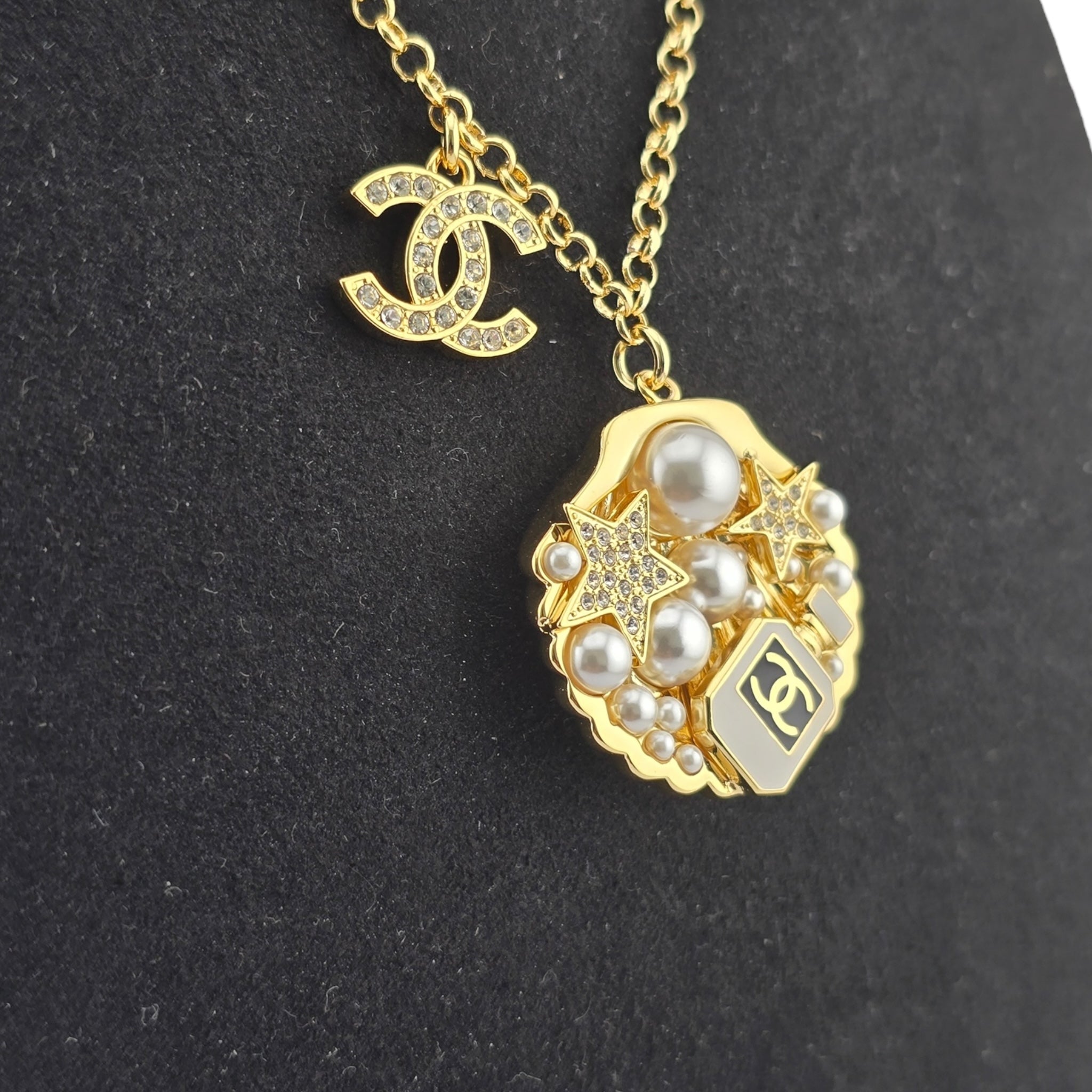 Chanel CC Shell Pendant Gold Necklace 2025 CHANEL