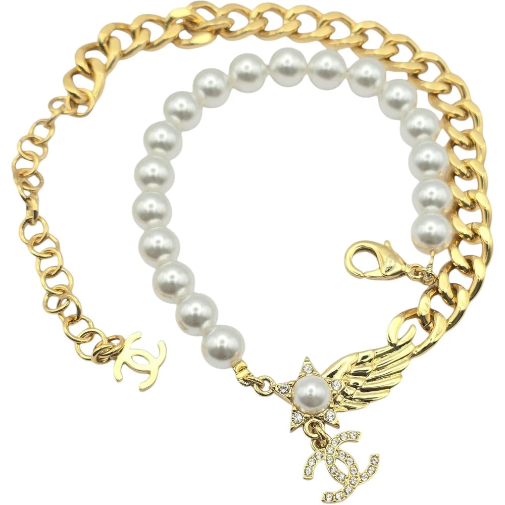 Chanel CC Star Wing Faux Pearl Choker Necklace 2024 CHANEL