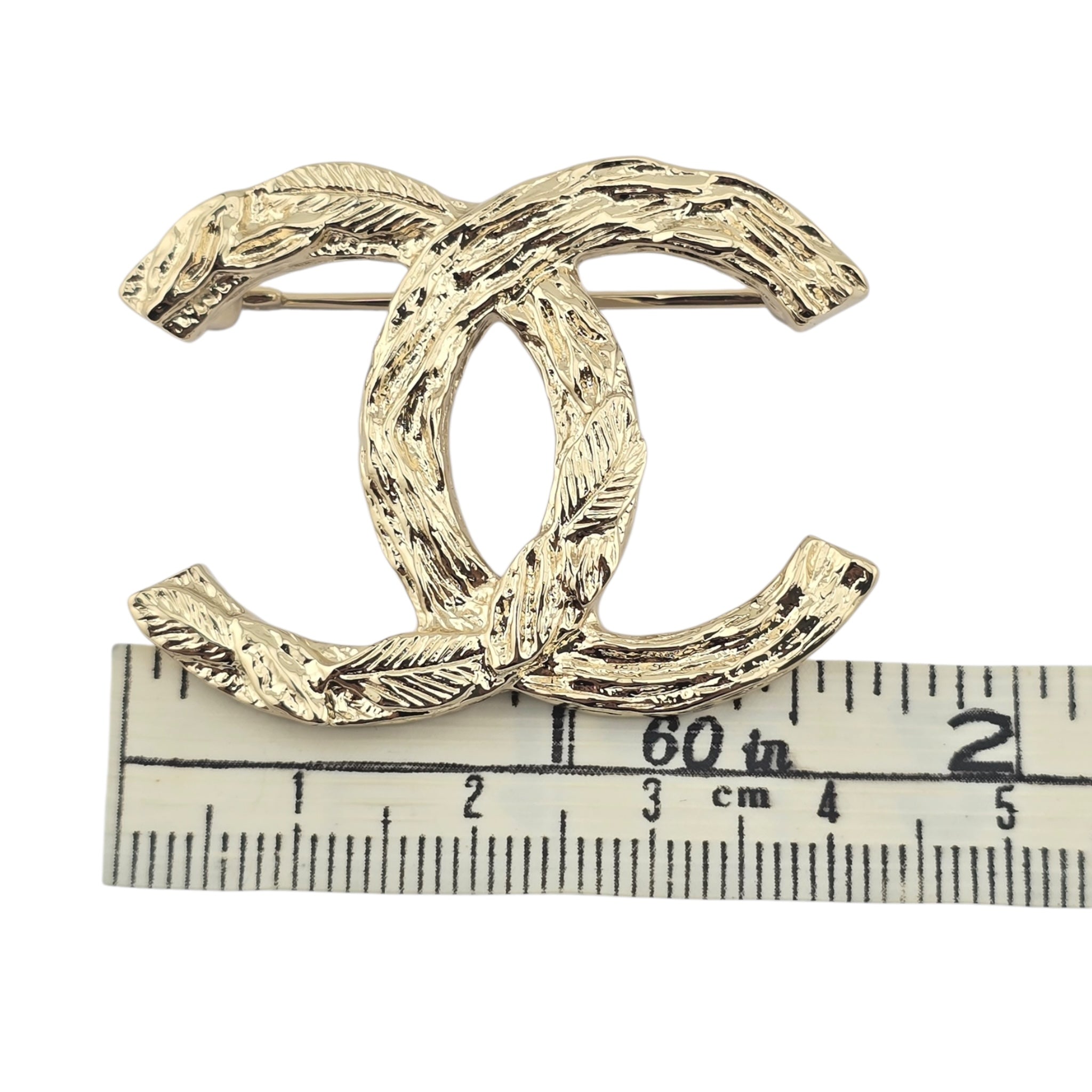 Chanel CC Metal Gold Brooch 2025 CHANEL