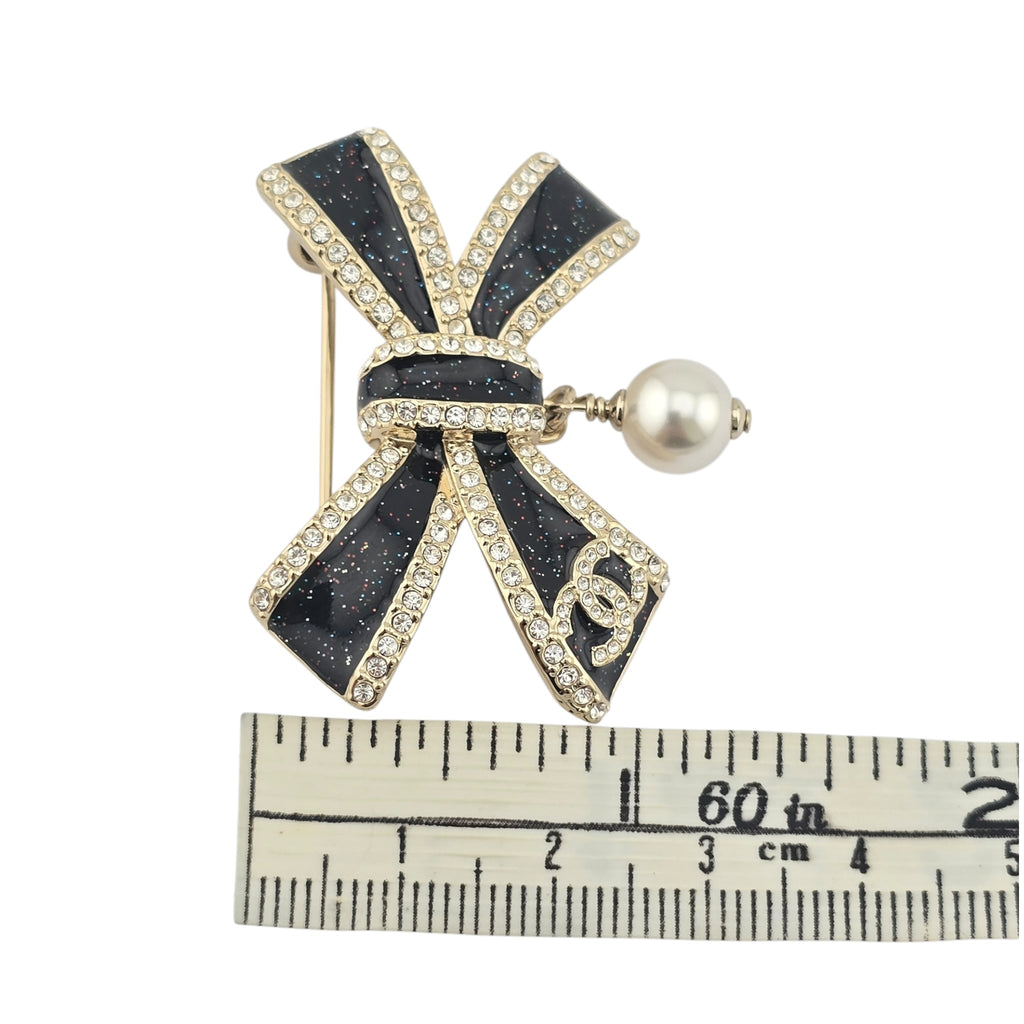 Chanel CC Gold Black Bow Brooch 2025 CHANEL