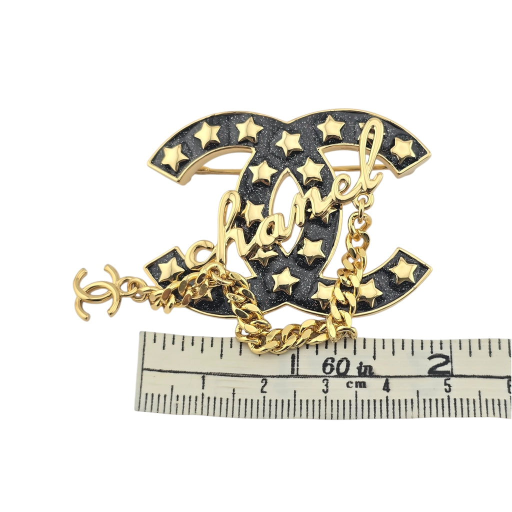 Chanel CC Metal Resin Star Logo Brooch Gold Black 2024 CHANEL